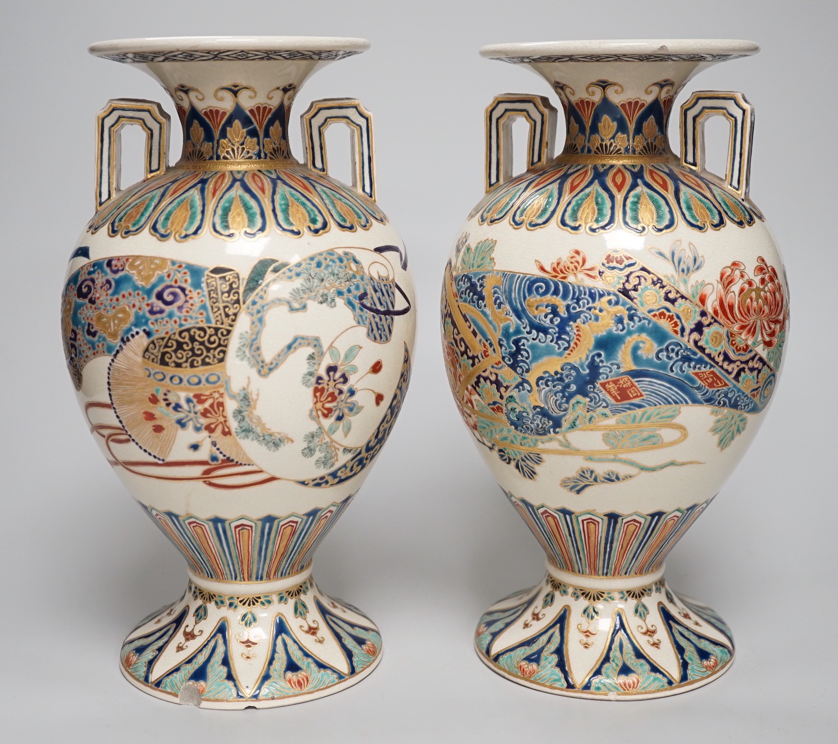 A pair of Japanese Satsuma gosu blue vases, Meiji period, signed to base. 24cm